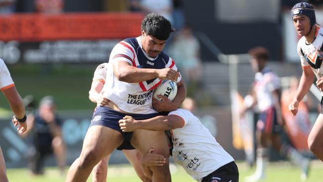 Blessing Foini on the charge for the Roosters. Picture: Sue Graham