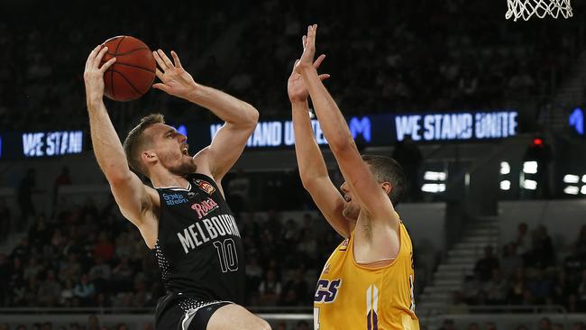 Mitch McCarron of United drives to the basket.