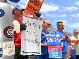 Workers at Lismore Base Hospital stage a protest outside the hospitals front entrance to call for an urgent increase in security staff and staffing in the Emergency Department. Picture: Marc Stapelberg