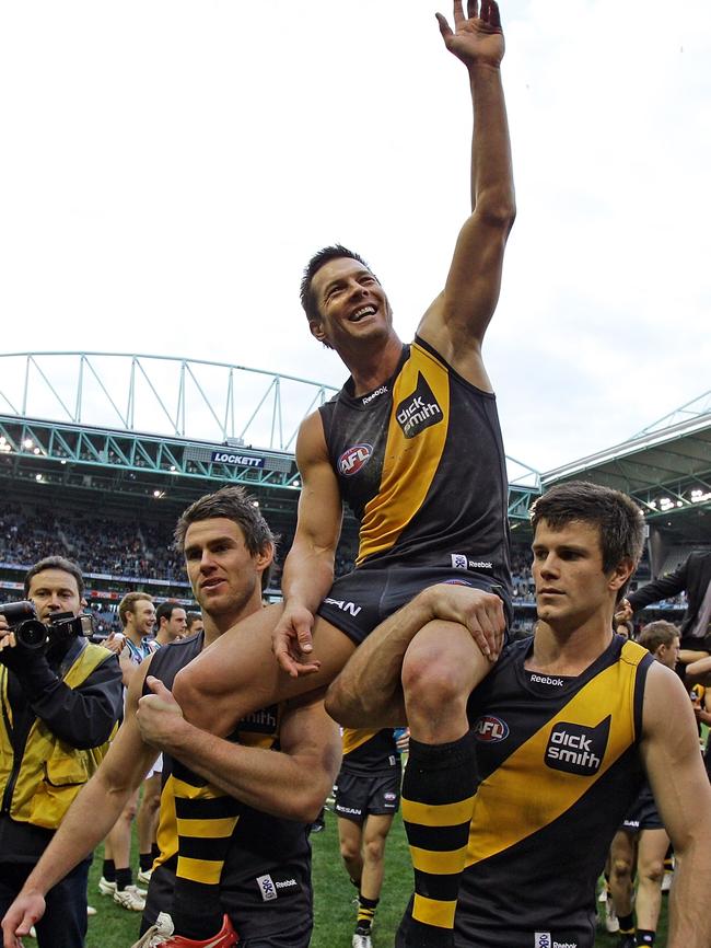 Cousins is chaired from the ground in 2010 after his final game for Richmond. Picture: Getty