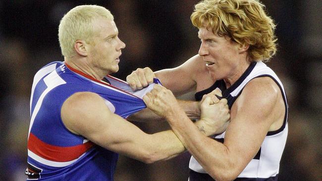 Adam Cooney and Cameron Ling tangle in 2007.