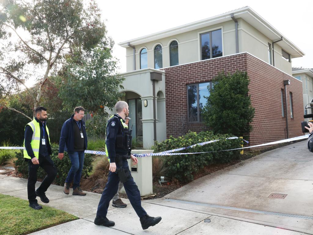 Police attend the Chadstone house where the woman and two children were rescued. Picture: David Crosling