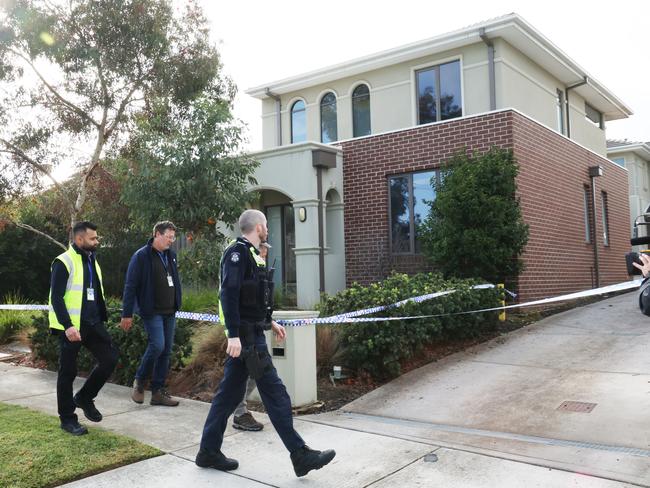 Police attend the Chadstone house where the woman and two children were rescued. Picture: David Crosling
