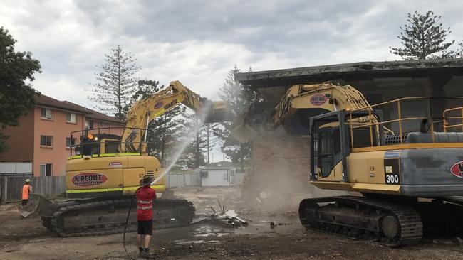 The Sunset Strip Holiday Lodge on Boundary St, Coolangatta, is knocked down on November 13, 2020. Photo: Timothy Hend