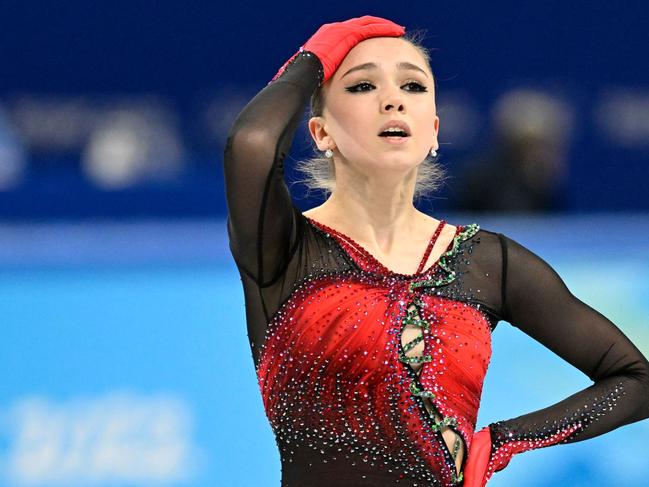 Russia's Kamila Valieva reacts after competing in the women's single skating free skating of the figure skating team event during the Beijing 2022 Winter Olympic Games at the Capital Indoor Stadium in Beijing on February 7, 2022. - The 15-year-old figure skating star Kamila Valieva, who led Russia to team gold at the Beijing Olympics this week, tested positive for a banned heart medication before the Games, Russian media have reported.  The positive test could cost Russia the team gold and also threatens Valieva's participation in the individual event that starts on Tuesday.  The sample was obtained before Valieva won the European championship last month, the RBC newspaper reported late Wednesday. The drug detected is trimetazidine, a metabolic agent that is prescribed for the treatment of angina and vertigo, according to Kommersant newspaper. It is banned by the World Anti-Doping Agency because it can increase blood flow efficiency and help endurance. (Photo by WANG Zhao / AFP)