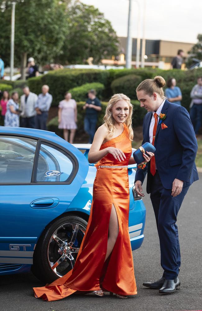 Graduate Lucy Hutchinson and partner Alex King arrive at Mary MacKillop Catholic College formal at Highfields Cultural Centre, Thursday, November 14, 2024. Picture: Kevin Farmer