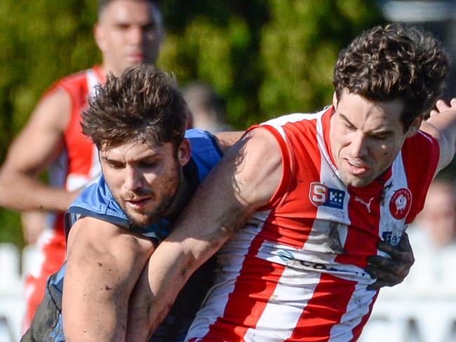 AUGUST 20, 2022: NorthÃs Harrison Elbow muscles out SturtÃs James Battersby during the SANFL game between Sturt and North Adelaide at Unley Oval. Picture: Brenton Edwards