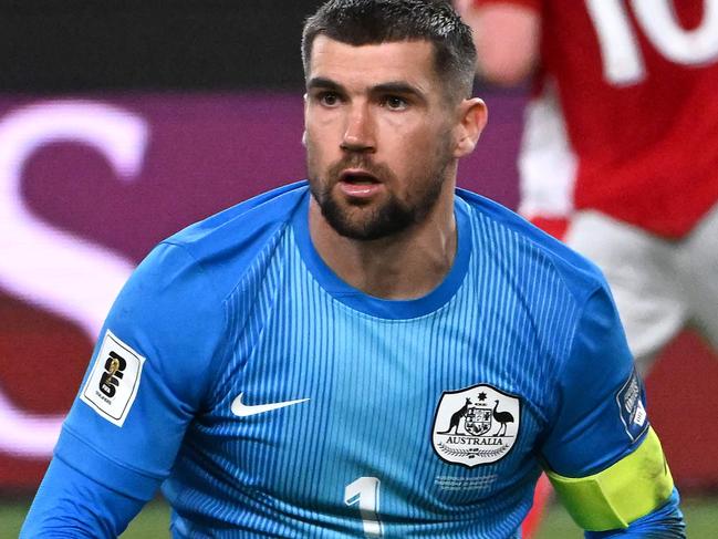 Australia's Mat Ryan clears the ball during the World Cup 2026 Asian qualifier football match between Australia and Indonesia in Sydney on March 20, 2025. (Photo by Saeed KHAN / AFP) / -- IMAGE RESTRICTED TO EDITORIAL USE - STRICTLY NO COMMERCIAL USE --