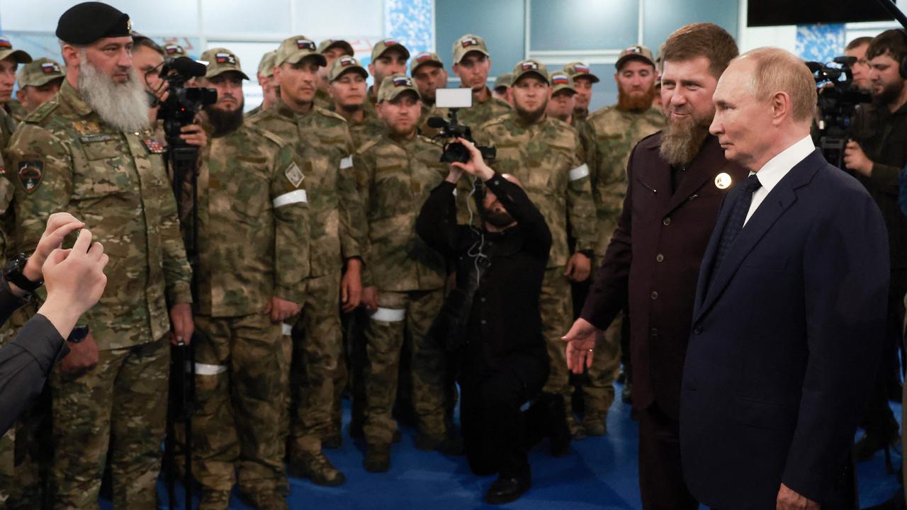 Russia's President Vladimir Putin, with head of the Chechen Republic Ramzan Kadyrov, second right, visit the "Russian Spetsnaz University" special forces training centre in Gudermes on August 20. Picture: Vyacheslav Prokofyev/POOL/AFP/distributed by Russian state-owned agency Sputnik