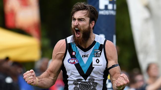 Charlie Dixon kicked five goals to inspire Port Adelaide to a 45-point win over Melbourne. AAP Image/Dan Peled.
