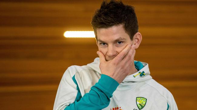 Australia cricket team captain Tim Paine gestures at a press conference to discuss his preparation to defend the Ashes against England this summer, at the National Cricket Centre in Brisbane on June 14, 2021. (Photo by Patrick HAMILTON / AFP)