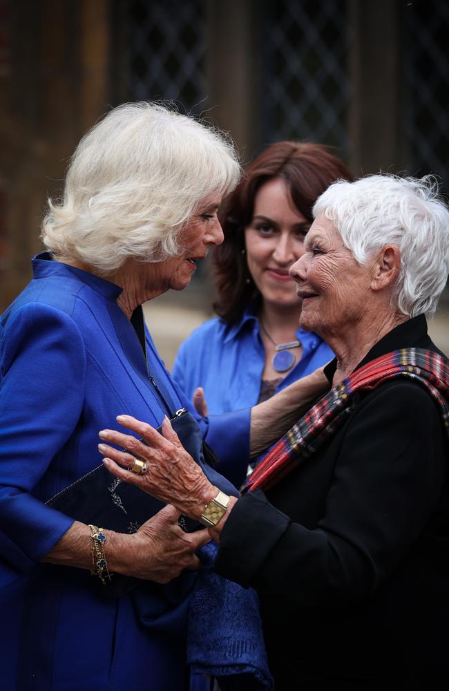 Queen Camilla (L) meets with British actress Judi Dench during a reception for the inaugural Queen's Reading Room Literary Festival in London, England. Picture: Adrian Dennis/WPA Pool/Getty Images