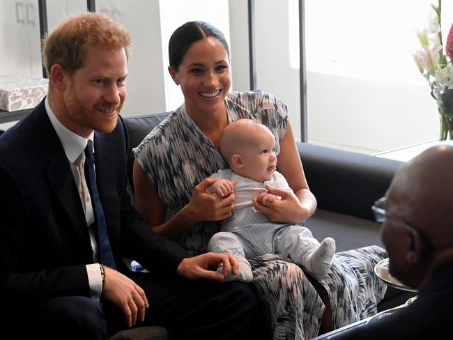 Archie’s proud parents Harry and Meghan meet Archbishop Desmond Tutu. Picture: Toby Melville/Getty Images