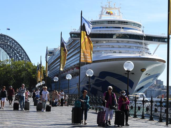 Cruise ship passengers disembark from the Princess Cruises owned Ruby Princess at Circular Quay on Thursday. Picture: AAP