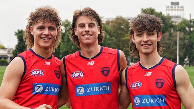 Draftees Koltyn Tholstrup, Caleb Windsor and Kynan Brown on their first official day as Demons. Picture: Melbourne FC