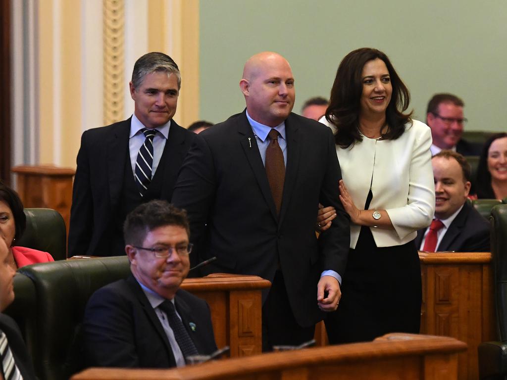 Newly announced Queensland parliament Speaker Curtis Pitt is led to his chair by the Premier Annastacia Palaszczuk (right) and the Member for Traeger Robbie Katter on February 13, 2018. Picture: AAP Image/Dan Peled