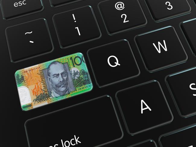 Australian Dollar Note on Computer Keyboard. generic money technology