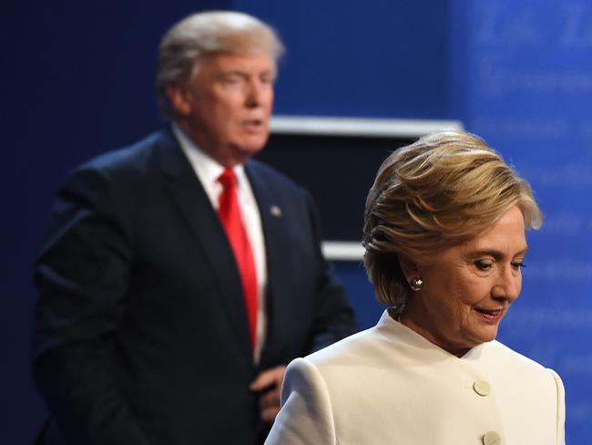 Democratic nominee Hillary Clinton and Donald Trump walk off the stage after the final presidential debate in 2016. Picture: Robyn Beck / AFP