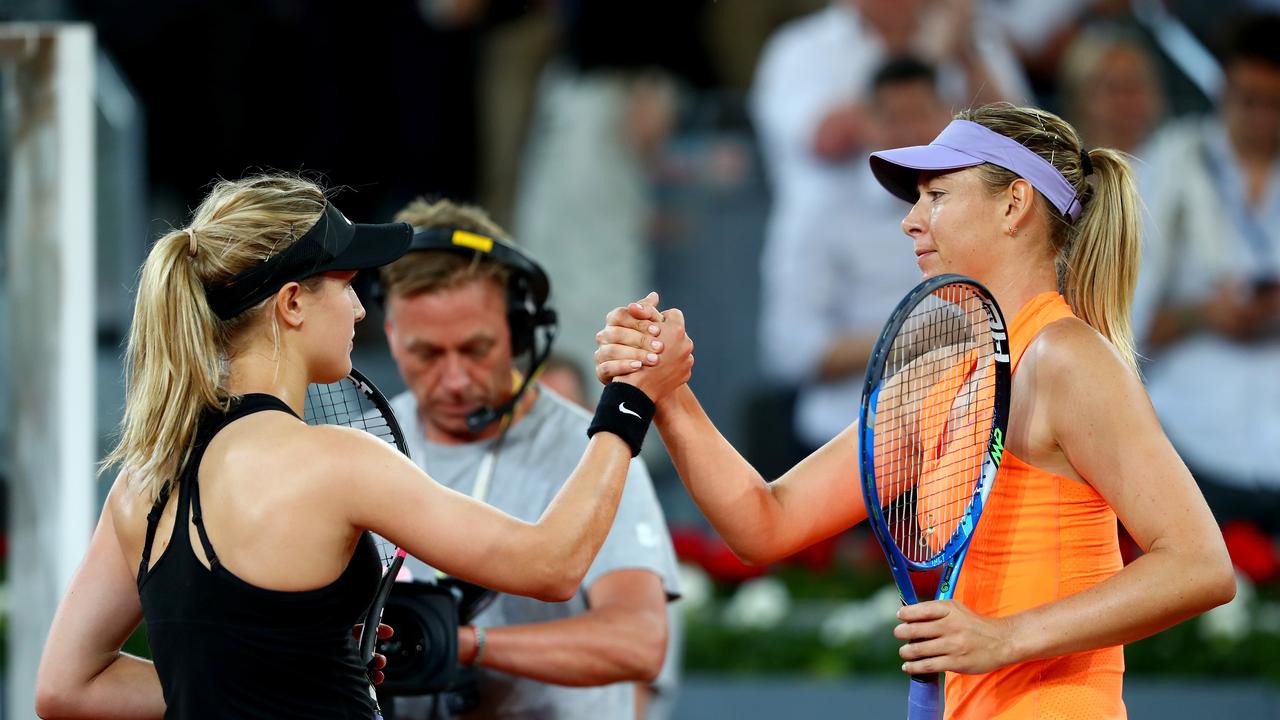 It was a frosty meeting at the net. (Photo by Clive Rose/Getty Images)