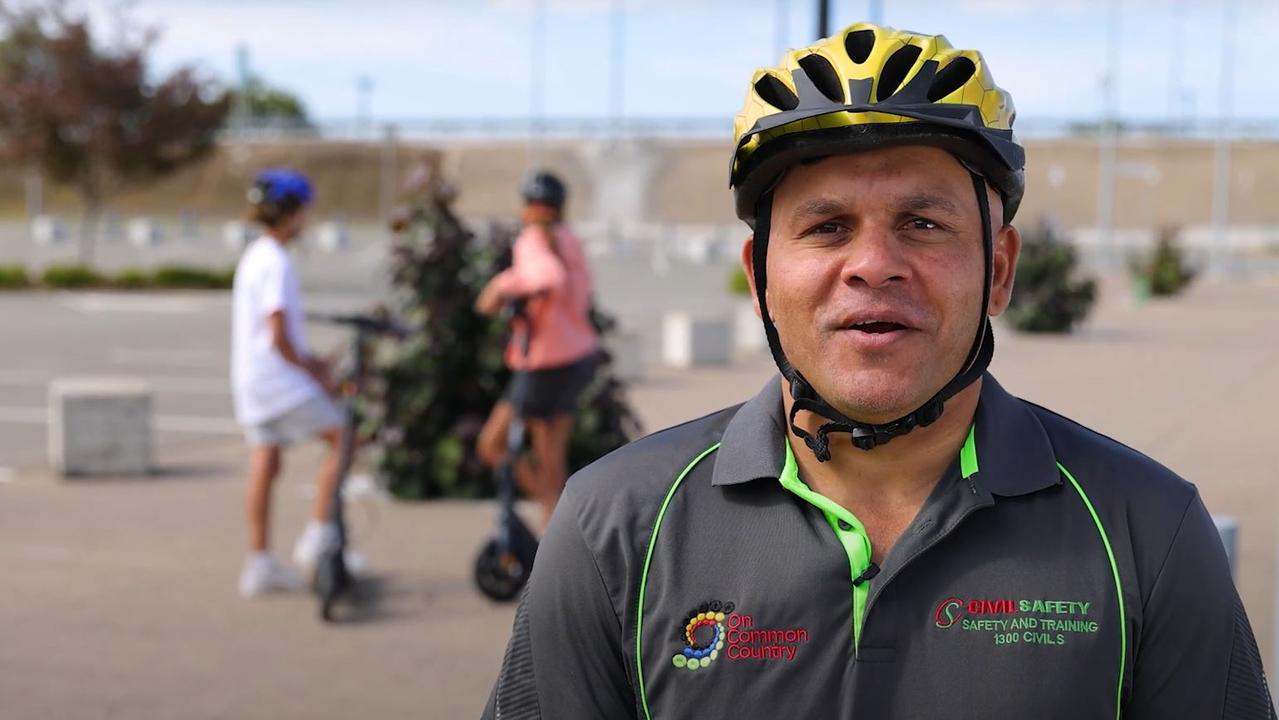 Matty Bowen in action during the e-scooter safety campaign video, urging Townsville riders to stay safe and follow the rules. Source: YouTube/On Common Country