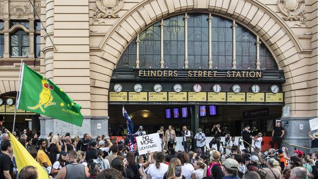 Anti-lockdown protesters gather at Flinders Street Station as Victoria is plunged into a third set of Covid restrictions. Picture: Getty Images