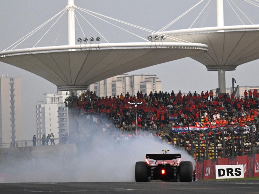 Smoke comes from the car of Ferrari's Spanish driver Carlos Sainz Jr during the qualifying session. Picture: AFP