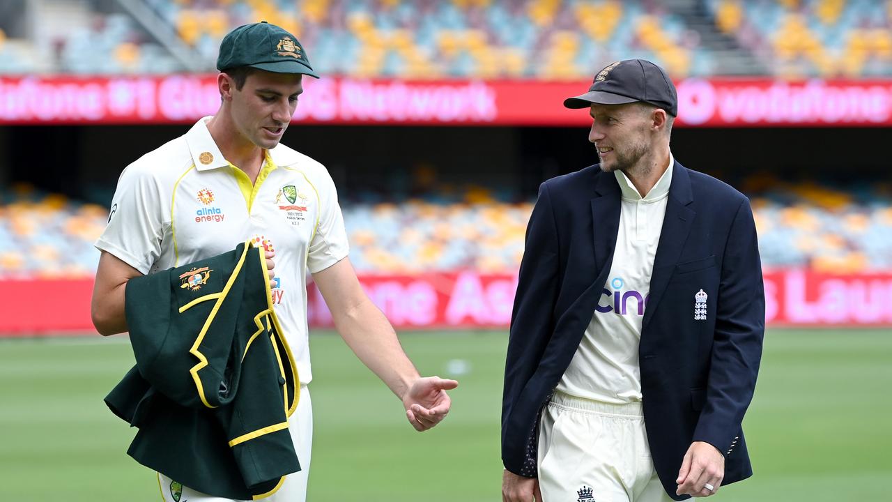 Australia captain Pat Cummins chats to England skipper Joe Root at the Gabba. Picture: Bradley Kanaris/Getty