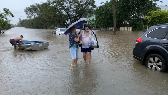 Overnight, State Emergency Services (SES) door knocked hundreds of homes in the danger zone to advise residents to urgently leave or risk being trapped by quickly rising floodwater. Picture: Stuart Cumming
