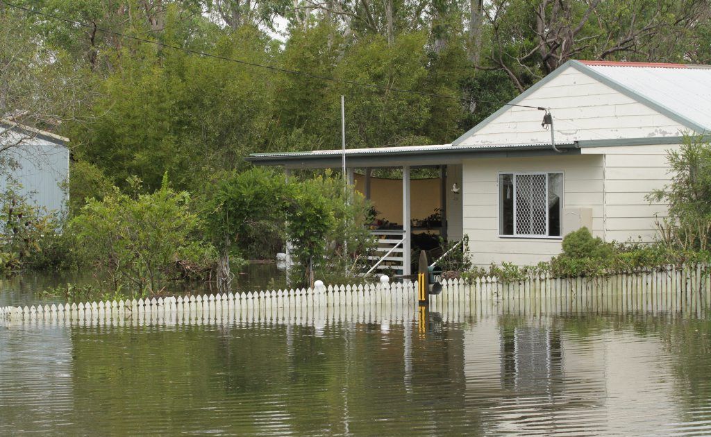 One of the houses in Aldershot taking in water midafternoon on Sunday. The high tide is expected to cause further inundation. Photo: Robyne Cuerel / Fraser Coast Chronicle. Picture: Robyne Cuerel