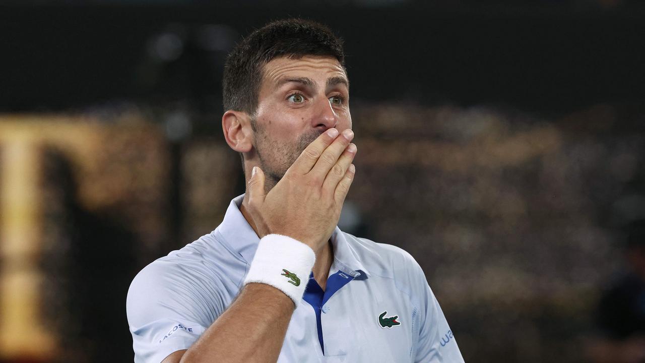 Fans weren’t happy with Novak Djokovic’s fourth round act. (Photo by David GRAY / AFP)