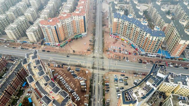 This aerial image shows nearly empty roads in an area closed off and restricted due to an outbreak of Covid-19, in Huaxian county in the city of Anyang, in China's central Henan province. Picture: AFP