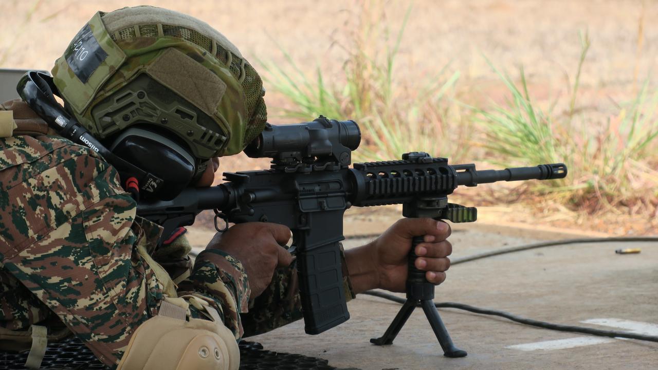 Australian and Timorese soldiers conducting marksmanship practice at Robertson Barracks on Thursday.