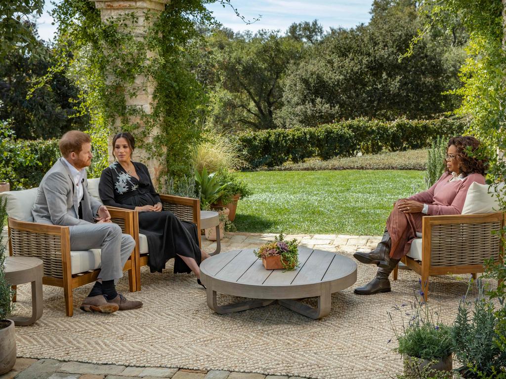 Prince Harry (L) and his wife Meghan (C), Duchess of Sussex, in a conversation with US television host Oprah Winfrey. The broadcast smashed US ratings records. Picture: AFP