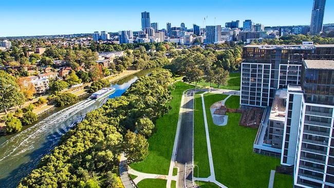 An aerial concept design of the Promenade unit complex (right) overlooking the Parramatta River.