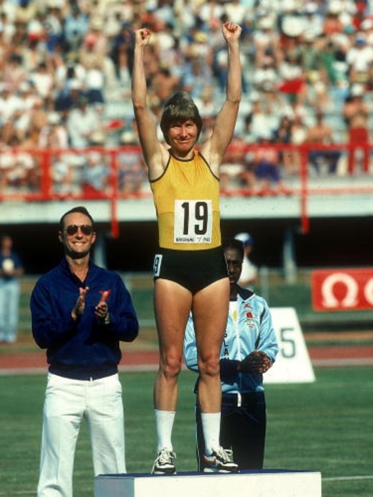 Raelene Boyle celebrates atop the podium at the 1982 Commonwealth Games in Brisbane. PictureL Getty Images