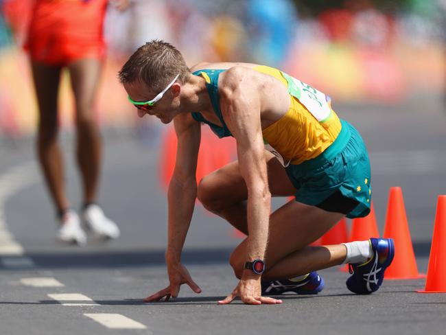 Silver medalist Jared Tallent collpased as he finished the 50km walk.