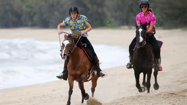 NuNu Restaurant at Palm Cove ran the popular Melbourne Cup Day race on the beach last year. Lily Bisset-O'Shea on Zena held out Tessa Grondsma on Free in the 2019 event. PICTURE: STEWART MCLEAN