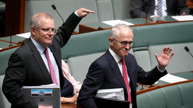 Treasurer Scott Morrison shows his support for Malcolm Turnbull as they both enter the chamber for Question Time today in the House of Representatives, Federal Parliament, Canberra.