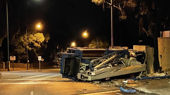 The wreck of the truck near the fountain on the Cross Rd/Freeway intersection. Picture: Dylan Hogarth