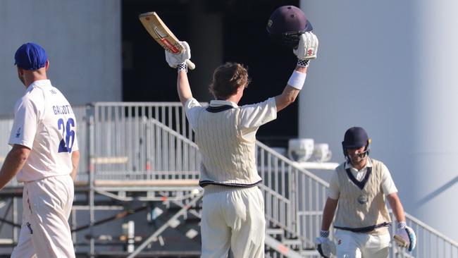Oliver Peake brings up his hundred against Greenvale Kangaroos. Picture: Carey Neate.