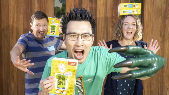 Childrens authors Oliver Phommavanh (centre) and Kate and Jol Temple ahead of the launch of Funny Bones at Marrickville Library on Sunday, November 24. Picture: Matthew Vasilescu