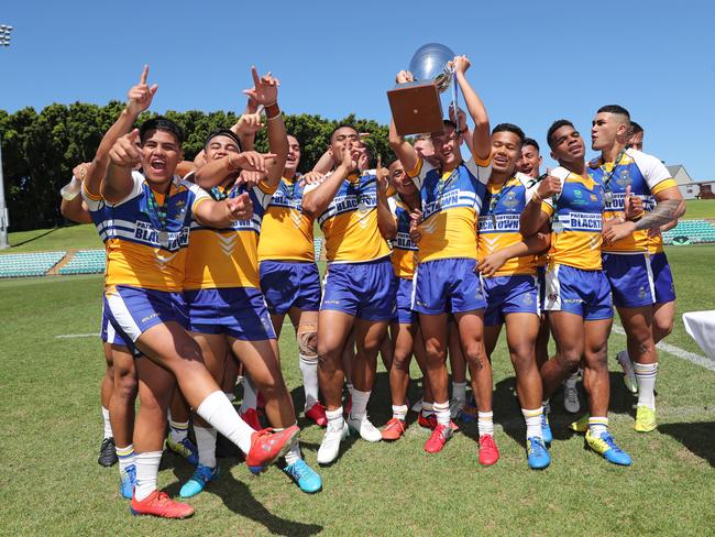 Patrician Brothers Blacktown players celebrating their 2020 NRL Schoolboy Cup title. Picture: Richard Dobson