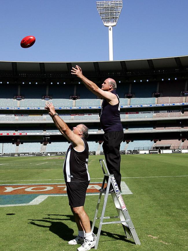 Graeme Jenkin and Alex Jesaulenko recreate the mark taken by Jesaulenko in the 1970 Grand Final.