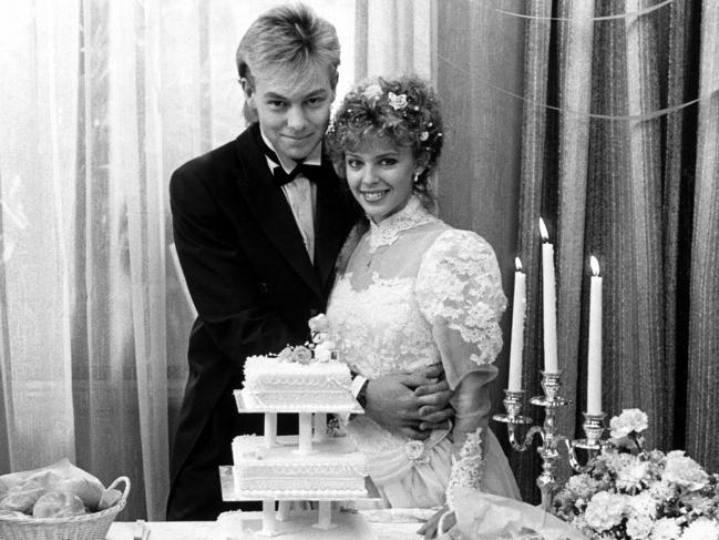 Jason Donovan and Kylie Minogue as Scott Robinson and Charlene Mitchell on their wedding day in 1989.