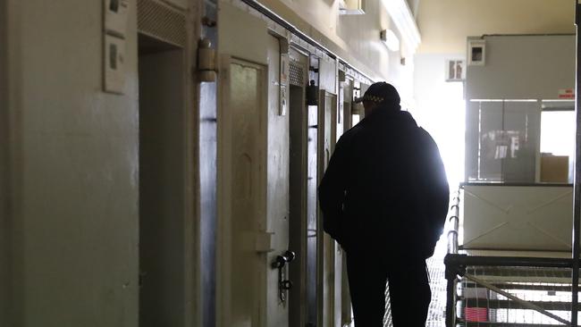 Pictured is a Prison Officer checking on a cell at Goulburn Correctional Centre. Picture: Tim Hunter.