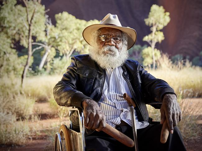 Traditional owner Reggie Uluru creates music for the journey.