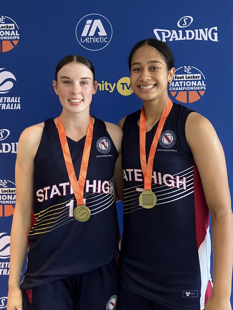 Prasayus Notoa and Sharni Reisinger after winning the Basketball Australia School Championships.