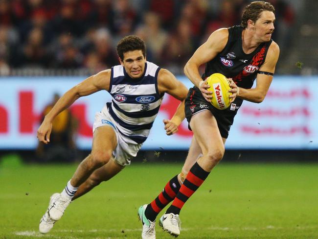 Barnaby Joyce saw the round eight match between Geelong and Essendon at the MCG on May 13, 2017. Pictured above: Nakia Cockatoo in pursuit of Joe Daniher. Picture: Michael Dodge/Getty Images