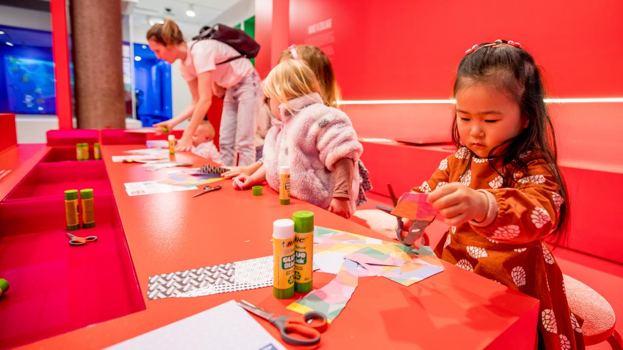 Collage – like this one being created at NGV kids’ exhibition Making Art: Imagine Everything is Real – is a great at-home art activity. Picture: Tim Carrafa
