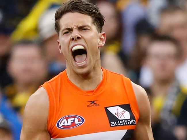 MELBOURNE, AUSTRALIA - SEPTEMBER 23: Josh Kelly of the Giants celebrates a goal during the 2017 AFL Second Preliminary Final match between the Richmond Tigers and the GWS Giants at the Melbourne Cricket Ground on September 23, 2017 in Melbourne, Australia. (Photo by Adam Trafford/AFL Media/Getty Images)